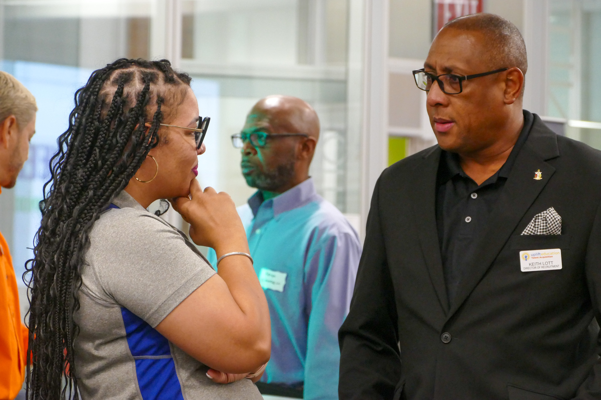 Attendees conversing in a small group at a R10 event